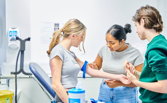Students working in a clinical setting